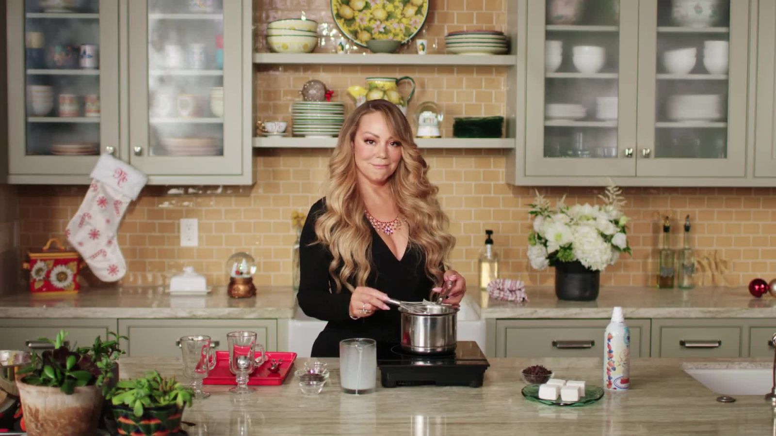 It’s Timeee! Get Into the Holiday Spirit by Watching Mariah Carey Bake Christmas Cookies